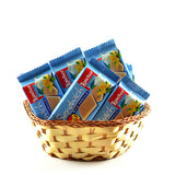 A small basket full of delicious biscuits